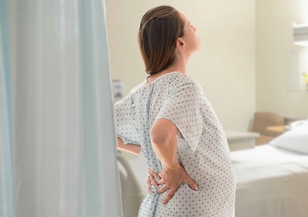 woman in labor standing